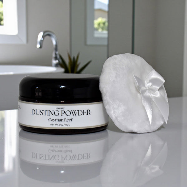 Dusting powder jar with a puff on a bathroom counter