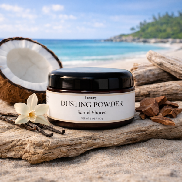 a jar of dusting powder in Santal Shores scent on the beach